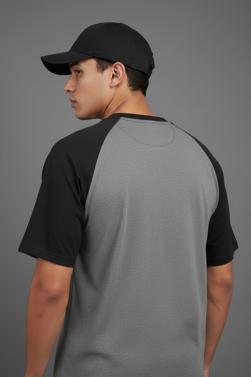 ZotRage oversized raglan t-shirt in black and charcoal melange cotton with a graphic warrior print on the front.