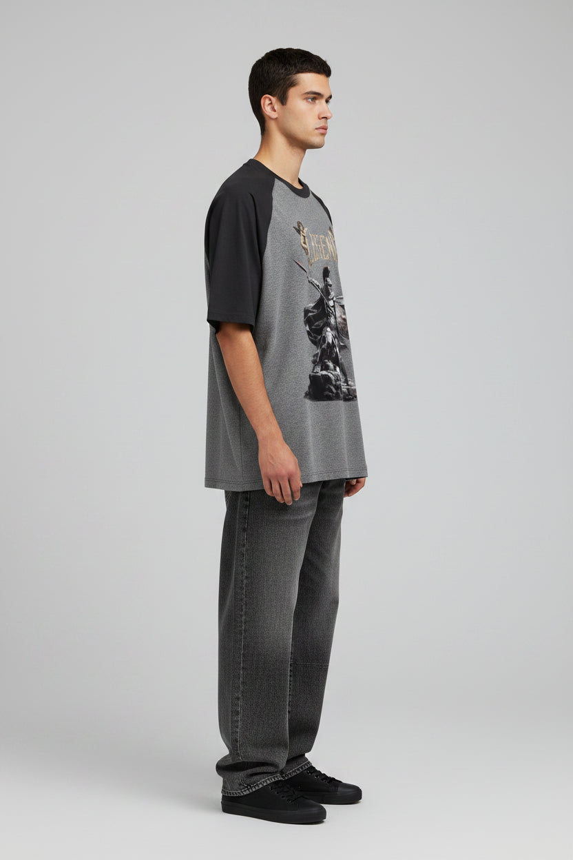 ZotRage oversized raglan t-shirt in black and charcoal melange cotton with a graphic warrior print on the front.