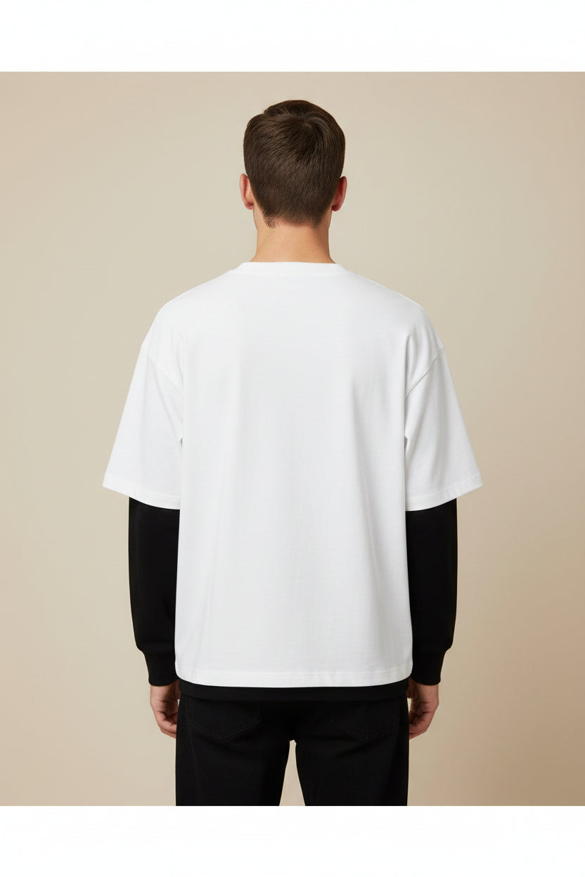 ZotRage oversized waffle-knit tee in off-white with contrasting black long sleeves, back view.