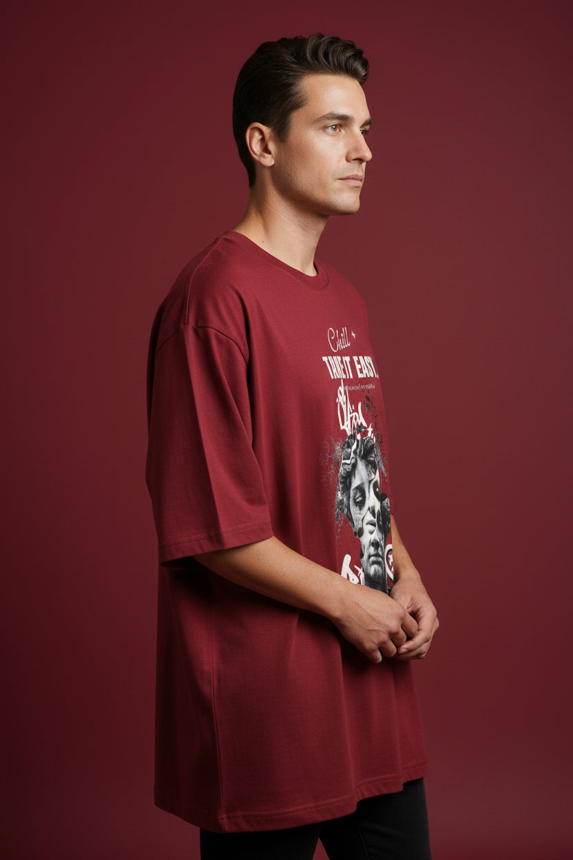 ZotRage red oversized cotton t-shirt featuring a graphic print of a classical statue head and graffiti text