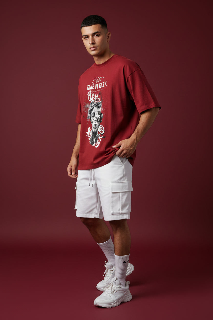 ZotRage red oversized cotton t-shirt featuring a graphic print of a classical statue head and graffiti text