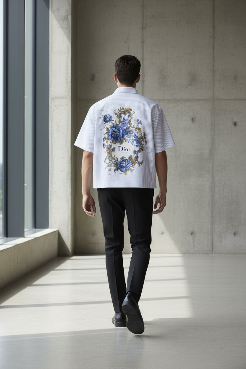 ZotRage boxy short-sleeve shirt in white with blue stripes and a large floral vase graphic on the back
