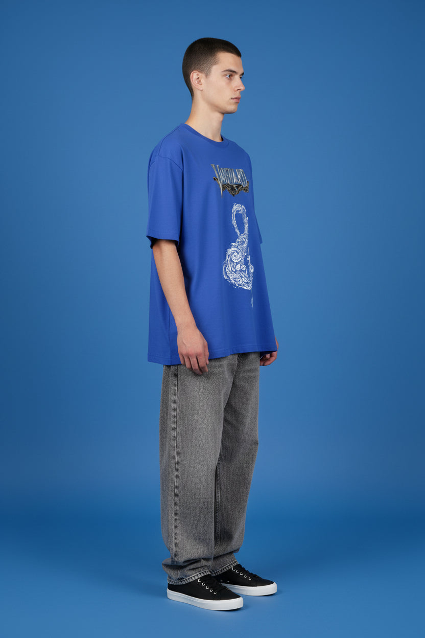 ZotRage royal blue oversized t-shirt featuring a white graphic of a sea god and the Vanguard logo