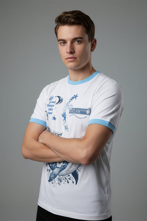 ZotRage white ringer t-shirt with blue trim and a detailed floral whale graphic with ocean-themed text.