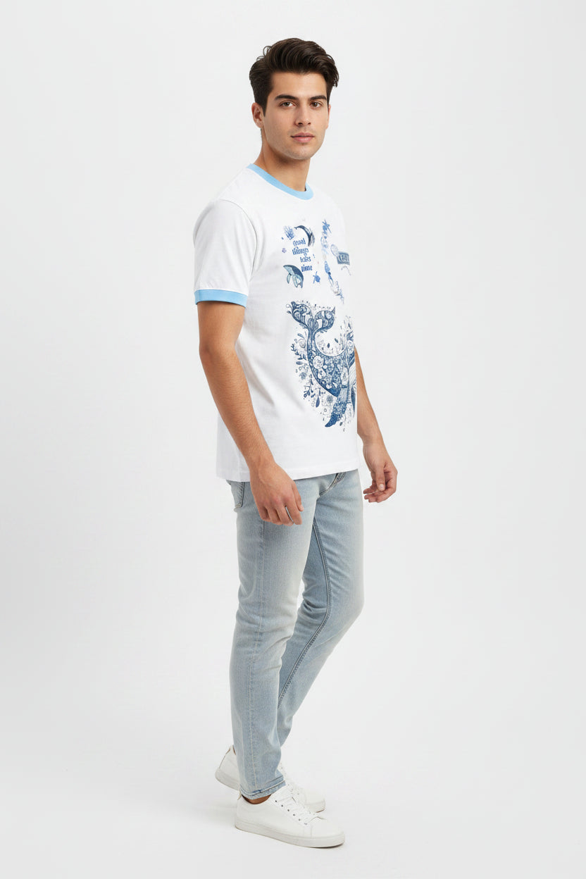 ZotRage white ringer t-shirt with blue trim and a detailed floral whale graphic with ocean-themed text.