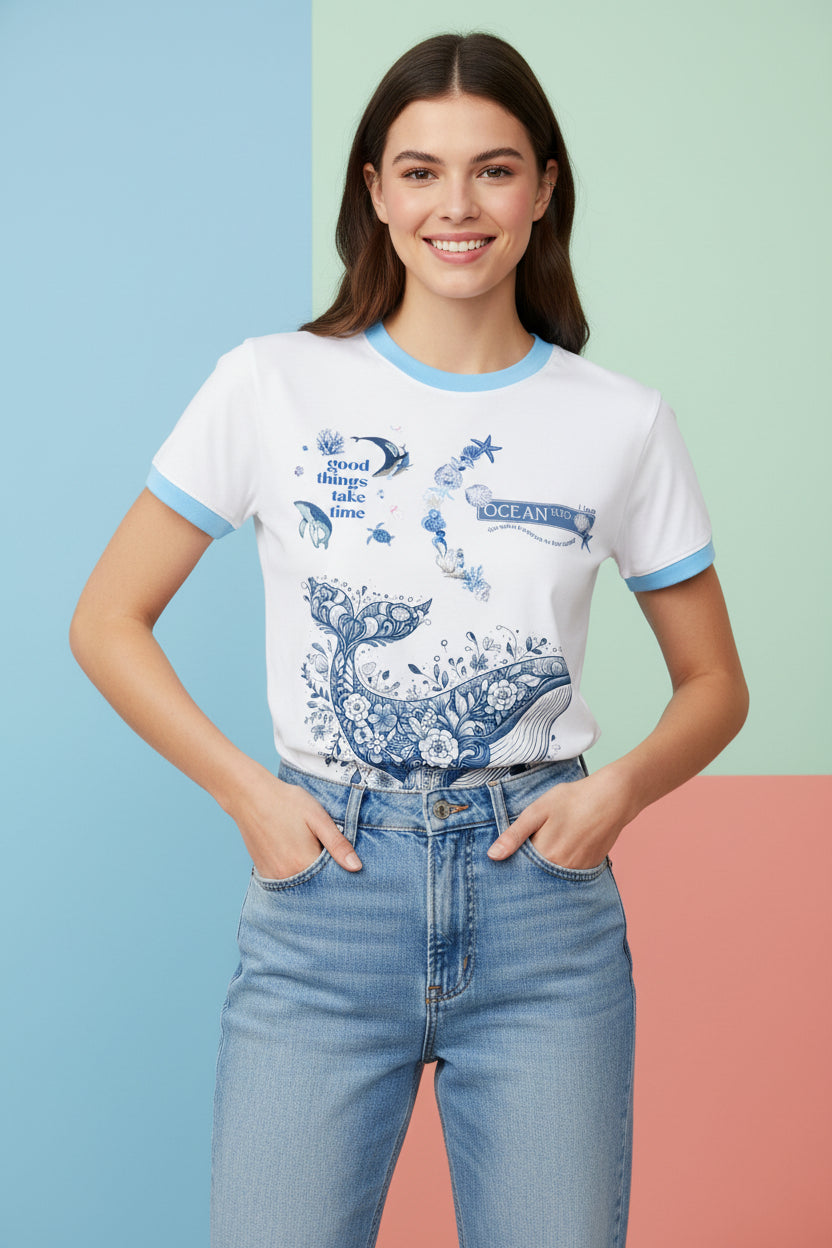 ZotRage white ringer t-shirt with blue trim and a detailed blue floral whale graphic with ocean-themed text.