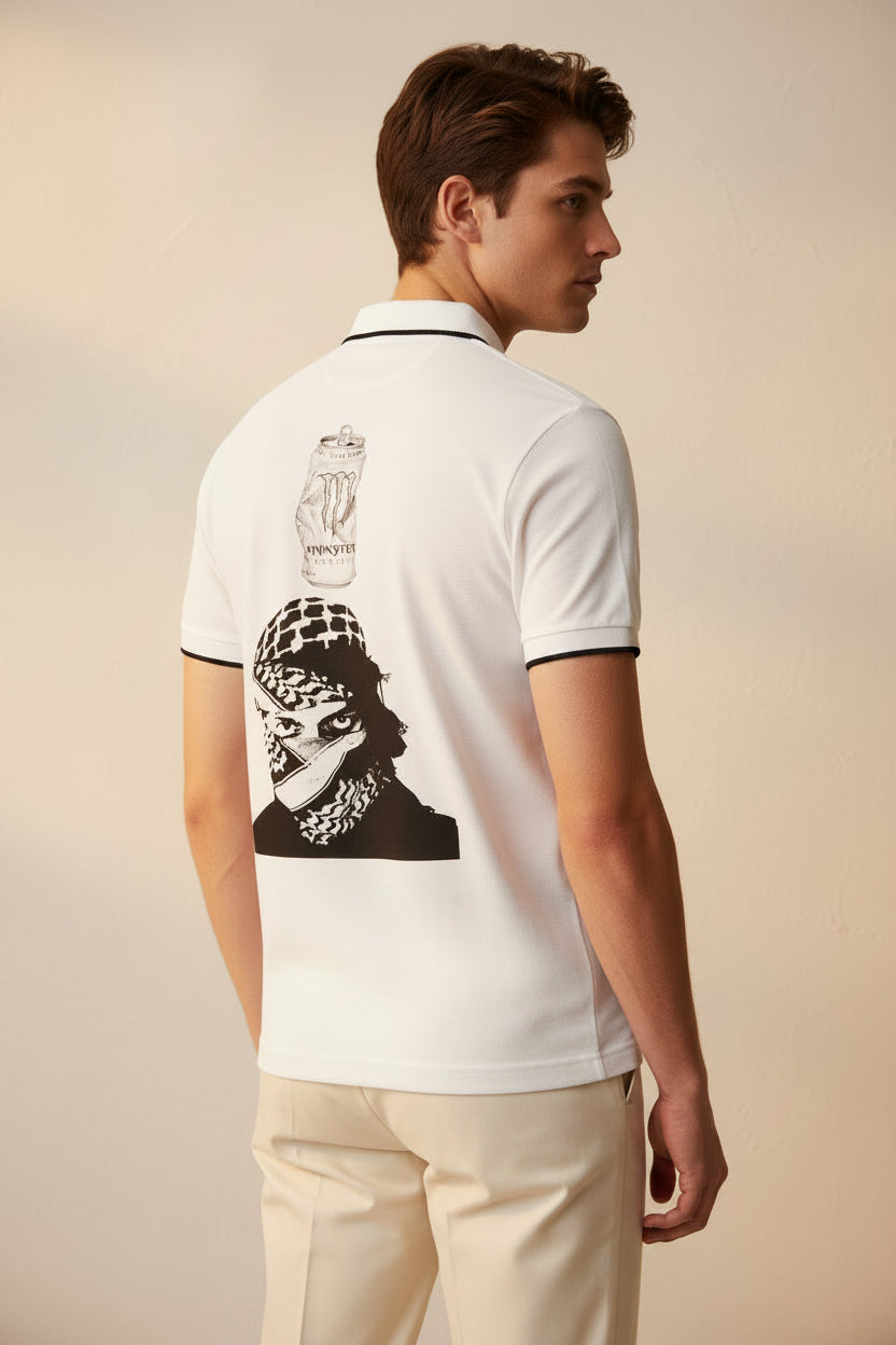 ZotRage white cotton polo shirt featuring a black and white graphic of a masked figure and a Monster Energy can.