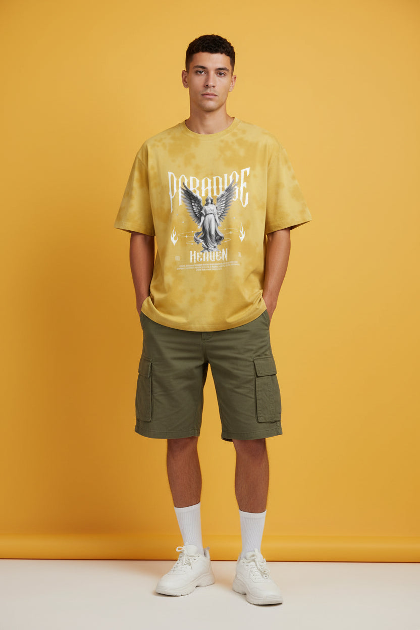 ZotRage yellow tie-dye oversized cotton-blend t-shirt featuring a graphic print of an angel with wings and text.
